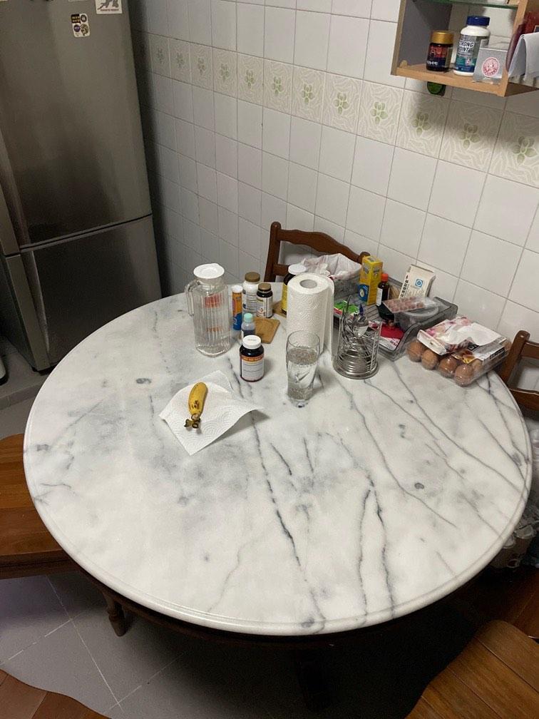Marble Table (Category: Tables & Sets) located in Singapore. Submitted by chalkboardconnection (Listing ID 1184200432, Image 1). Description: Marble table 4ft in diameter. So arrange your own delivery. Chairs are free.