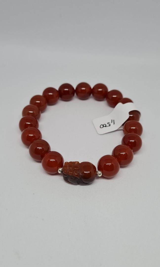 Nanhong Agate with Pixiu 10mm 16cm (Category: Bracelets) located in Bulacan. Submitted by dearphoenix (Listing ID 1184288980, Image 2). Description: Promotes courage and protection from evil intentions. 100% natural stones from HK Intuitively selected and handcrafted by me 🙂 Buy with confidence, do what makes you happy in these trying times. It won't hurt to have a pixiu at your side for lucky company. Please come back to view additional listing