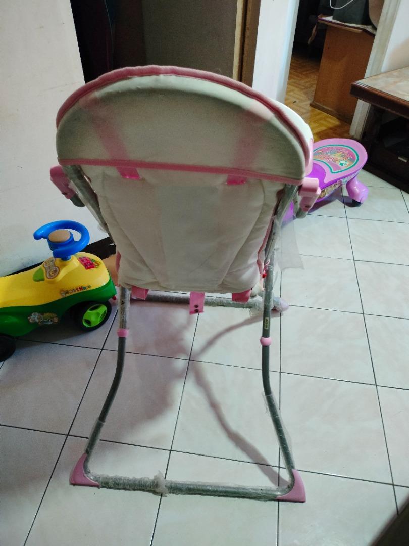 Pink foldable baby high chair (Category: Baby High Chairs) located in Manila. Submitted by shaestanque (Listing ID 1184107734, Image 2). Description: Pink foldable baby high chair May plastic pa po yung ibang parts means di sya masyadong nagamit. Call /sms me 09454421544.