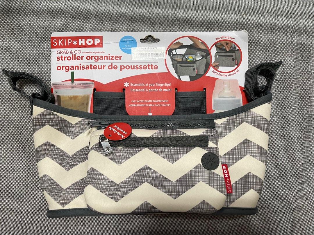 Skip Hop Grab & Go Stroller Organizer - Chevron (Category: Strollers) located in Marikina City. Submitted by unhoard_manila (Listing ID 1184178054, Image 1). Description: This insulated beverage and essentials caddy stretches to hold bottles and coffee cups securely, while providing easy access to your most important items. Fitting most stroller bars and handles, this organizer bag includes a detachable wristlet for errands and a headphone port f