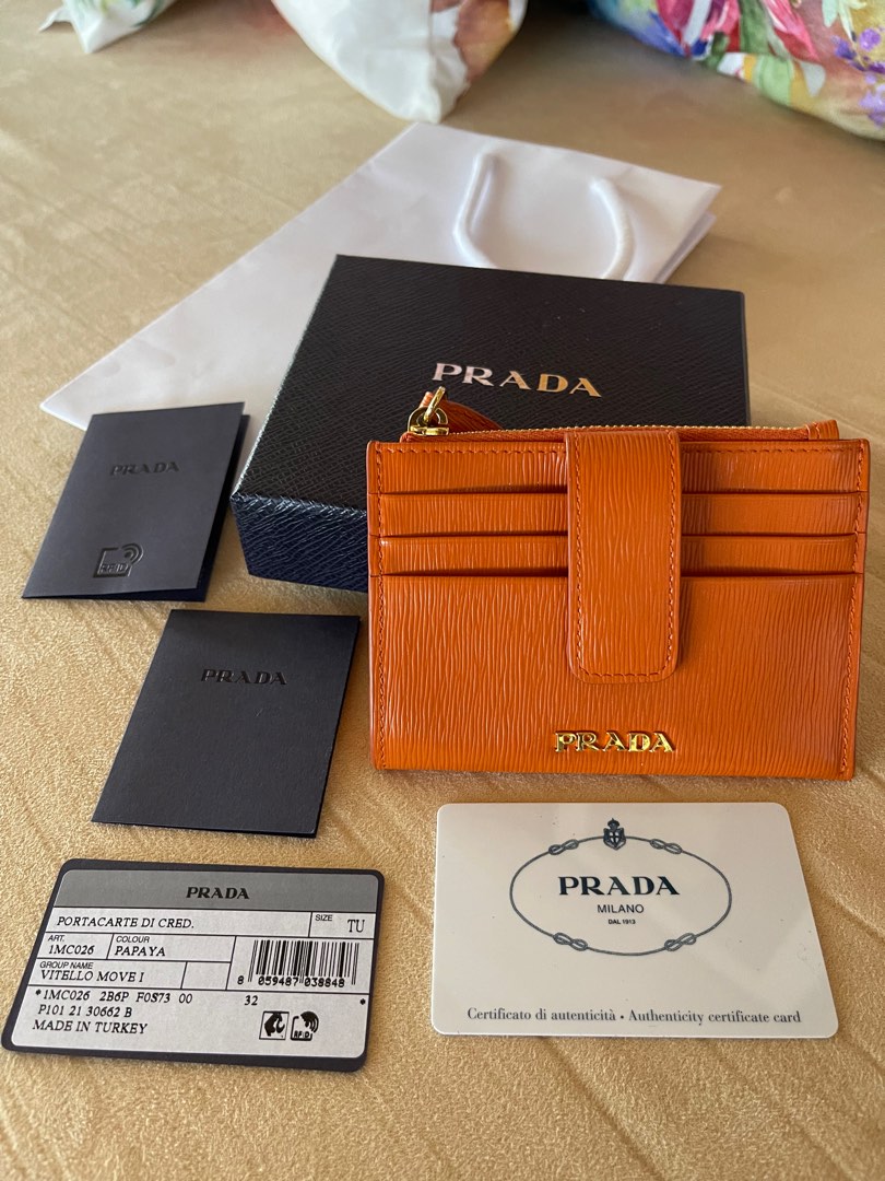 Authentic Prada papaya card holder, Luxury, Bags & Wallets on Carousell