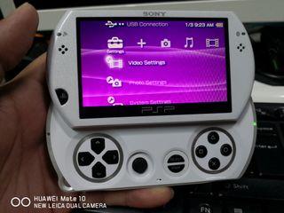 FOR SALE : SONY PSP GO, Pocket PSP, Pear white, 16gb with 36 Game's installed.