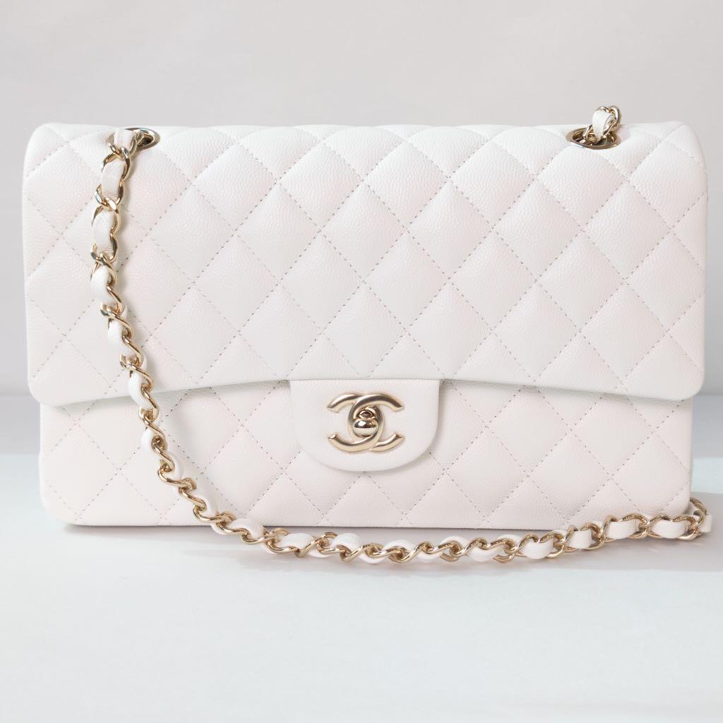 Chanel Classic flap medium white Caviar light gold hardware, Luxury, Bags &  Wallets on Carousell