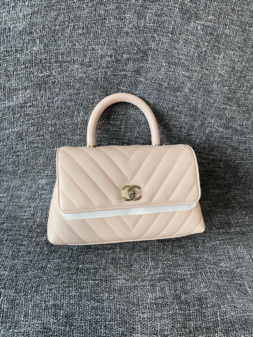 Chanel Coco Handle 20A Beige/Pink Chevron Caviar A92990, Luxury, Bags &  Wallets on Carousell