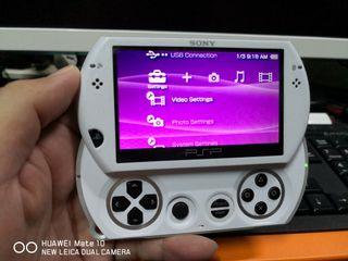 FOR SALE RUSH RUSH!! SONY PSP GO, Pocket PSP, Pear white, 16gb with 36 Game's installed.