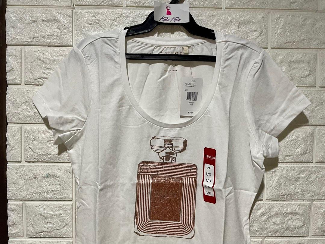 GUESS Perla Perfume Tee Medium/Large Women (Category: Shirts) located in Las Pinas. Submitted by waistnot (Listing ID 1184698087, Image 3). Description: Original item imported from Canada Available Color and Size 1. Vanda orchid (purple), Medium and Large 2. Pure White Large 3. Jet Black, Medium .