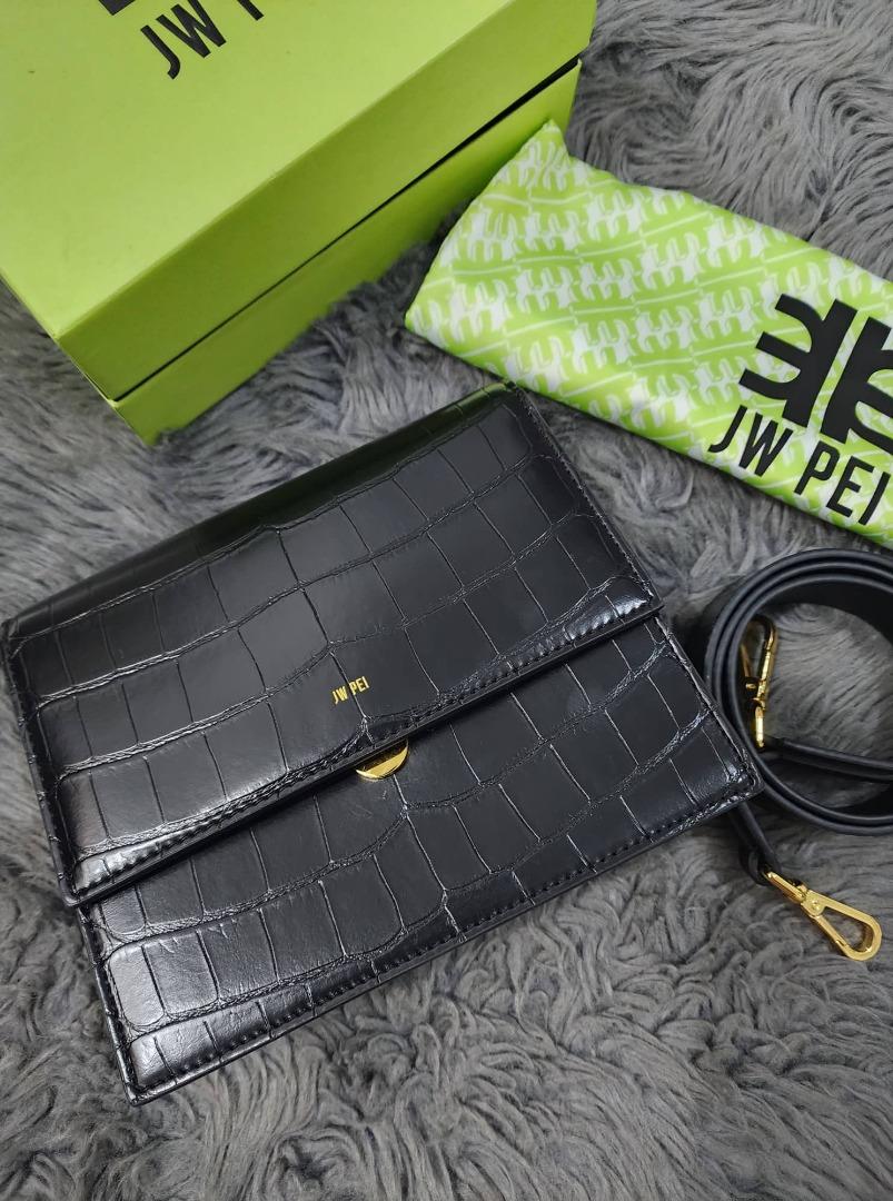 JW PEI Mini Flap Crossbody Bag (Category: Luxury Bags & Wallets) located in Pasig City. Submitted by closet_reframe (Listing ID 1184675458, Image 2). Description: 100% Authentic Used once With box, dust bag, tag inside Material: Vegan Leather Leather type: Croc-Embossed/Lizard-Embossed/Smooth Leather. Disclosure: Push-Lock Closure. Season: 2022 Spring. Compartment: 2 compartments. Side pockets: 2 Interior Pockets, 1 Zipping Pocket. Strap: Detacha