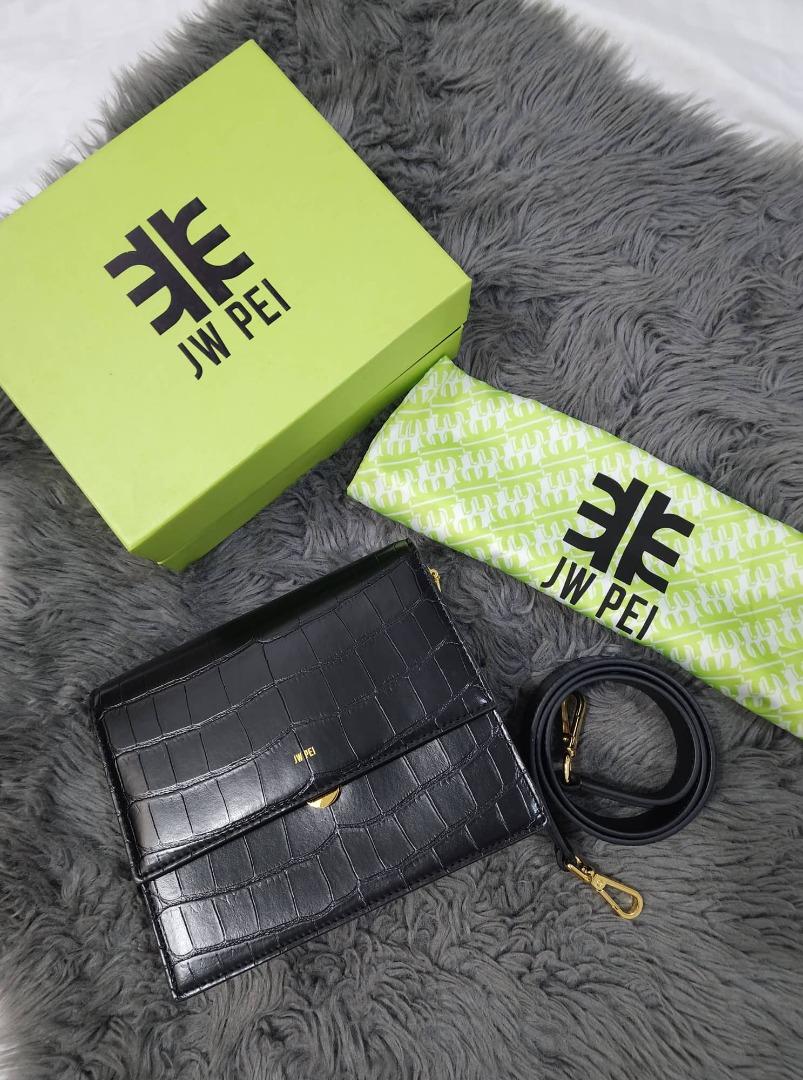 JW PEI Mini Flap Crossbody Bag (Category: Luxury Bags & Wallets) located in Pasig City. Submitted by closet_reframe (Listing ID 1184675458, Image 1). Description: 100% Authentic Used once With box, dust bag, tag inside Material: Vegan Leather Leather type: Croc-Embossed/Lizard-Embossed/Smooth Leather. Disclosure: Push-Lock Closure. Season: 2022 Spring. Compartment: 2 compartments. Side pockets: 2 Interior Pockets, 1 Zipping Pocket. Strap: Detacha