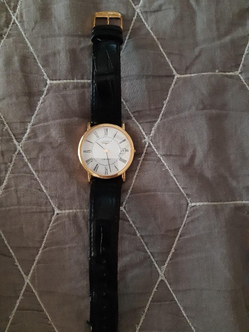 Longines mens (Category: Luxury Watches) located in Quezon City. Submitted by donald_draper (Listing ID 1184500261, Image 3). Description: Slightly used Longines LA Grande Classique (mens) 18 rose gold white face roman index, alligator leather. complete papers w/ box..