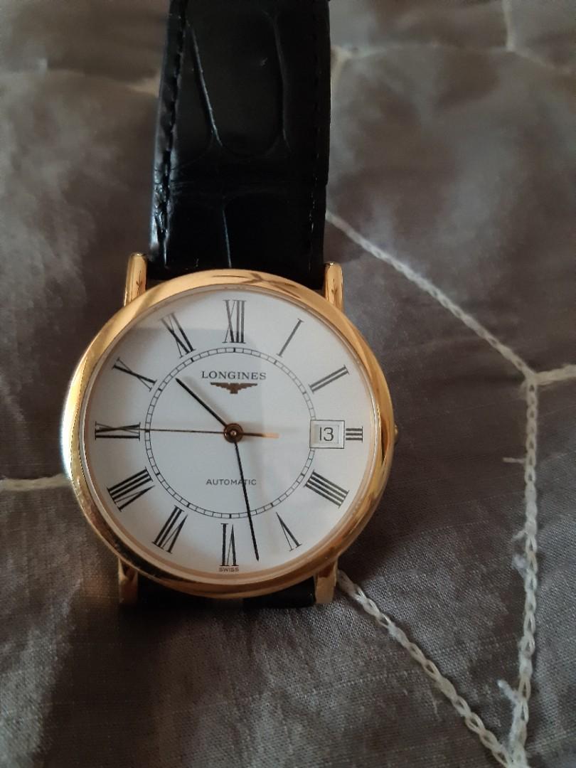 Longines mens (Category: Luxury Watches) located in Quezon City. Submitted by donald_draper (Listing ID 1184500261, Image 1). Description: Slightly used Longines LA Grande Classique (mens) 18 rose gold white face roman index, alligator leather. complete papers w/ box..