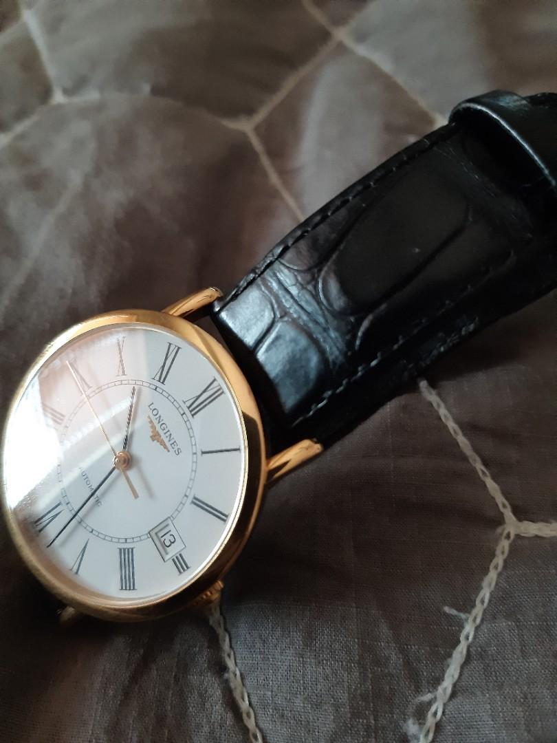 Longines mens (Category: Luxury Watches) located in Quezon City. Submitted by donald_draper (Listing ID 1184500261, Image 2). Description: Slightly used Longines LA Grande Classique (mens) 18 rose gold white face roman index, alligator leather. complete papers w/ box..