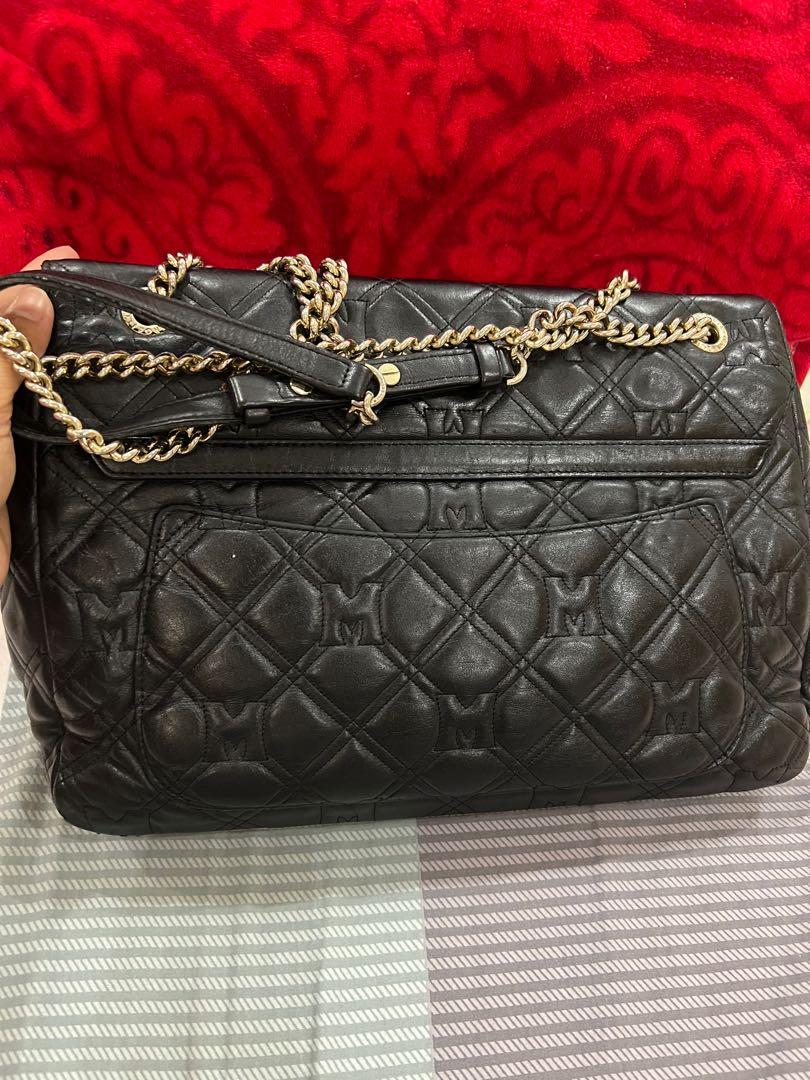 Authentic Metrocity sling bag (Category: Luxury Bags & Wallets) located in Quezon City. Submitted by annmhe01 (Listing ID 1184662729, Image 2). Description: Color black Two way sling bag Quilted Leather-di bakbakin Guaranted original Small to medium size Flaw-tarnished only refer to photos number 3 Negotiable.