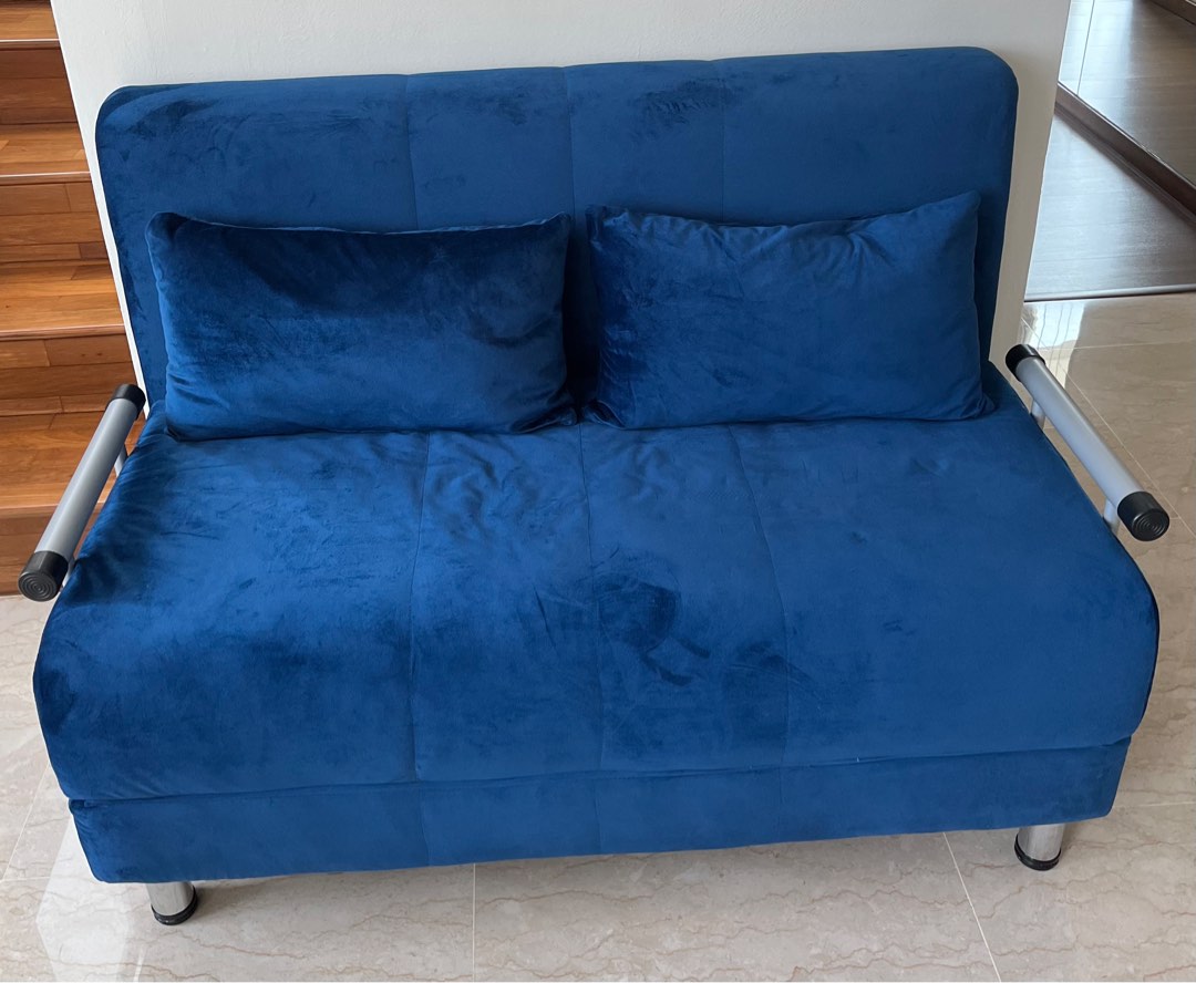 blue sofa bed with round cushion nyc