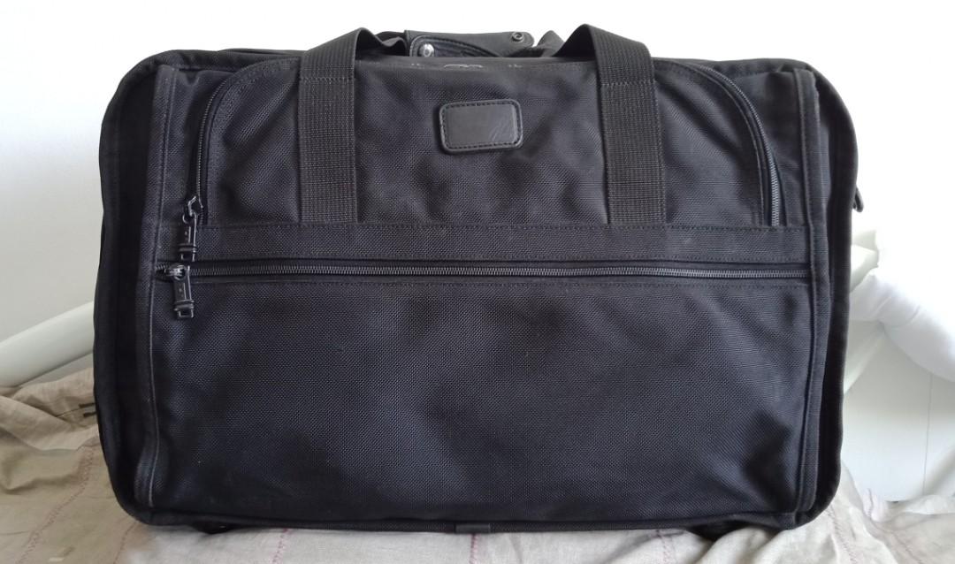 TUMI EXPANDABLE TRAVEL BAG (Category: Luxury Bags & Wallets) located in Iloilo. Submitted by Value.Center (Listing ID 1184567248, Image 1). Description: TUMI EXPANDABLE TRAVEL BAG DETAILS & MEASUREMENTS: Brand: Tumi Color: Black Materials: ballistic nylon Size: 14 x 22 x 8-10" expandable Strap: replacement only Flaws: negligible rubs on edges PAYMENT: "Pay First" via GCASH DELIVERY: J&T Express No COD, No meet ups Buyer to pay sf: P185 NOTES/OTHE