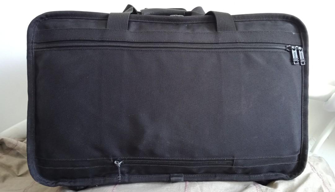 TUMI EXPANDABLE TRAVEL BAG (Category: Luxury Bags & Wallets) located in Iloilo. Submitted by Value.Center (Listing ID 1184567248, Image 2). Description: TUMI EXPANDABLE TRAVEL BAG DETAILS & MEASUREMENTS: Brand: Tumi Color: Black Materials: ballistic nylon Size: 14 x 22 x 8-10" expandable Strap: replacement only Flaws: negligible rubs on edges PAYMENT: "Pay First" via GCASH DELIVERY: J&T Express No COD, No meet ups Buyer to pay sf: P185 NOTES/OTHE
