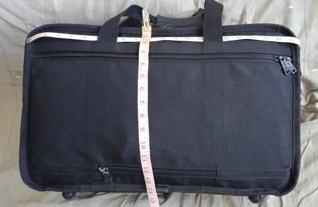 TUMI EXPANDABLE TRAVEL BAG (Category: Luxury Bags & Wallets) located in Iloilo. Submitted by Value.Center (Listing ID 1184567248, Image 3). Description: TUMI EXPANDABLE TRAVEL BAG DETAILS & MEASUREMENTS: Brand: Tumi Color: Black Materials: ballistic nylon Size: 14 x 22 x 8-10" expandable Strap: replacement only Flaws: negligible rubs on edges PAYMENT: "Pay First" via GCASH DELIVERY: J&T Express No COD, No meet ups Buyer to pay sf: P185 NOTES/OTHE