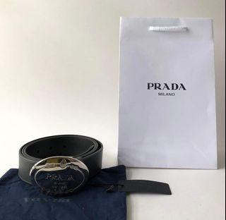 BRANDNEW PRADA SAFFIANO ROUND LOGO BELT Size100  Unisex 30mm Belt Grey Saffiano Lux Leather  Round Logo Plate Buckle  Size 100cm or 40” Comes with Tag, Dustbag  And Paperbag