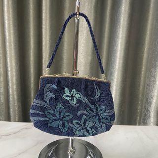 Fully beaded Blue evening bag with intricate flower design