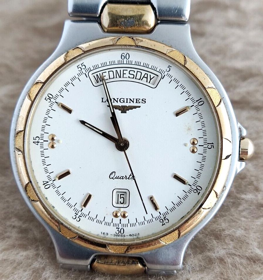 Longines conquest day hot sale date