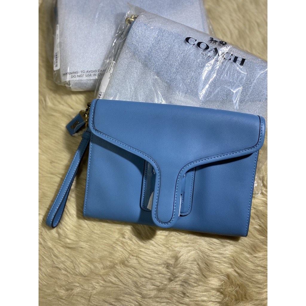 Coach courier shop wristlet
