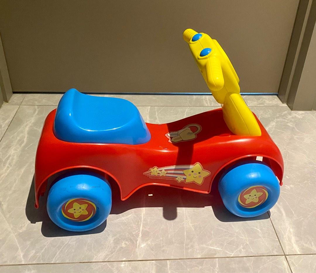 Fisher price store riding car