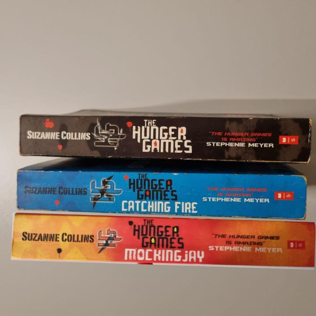 free delivery full set 3 books Hunger Games mockingjay and Catching Fire by Suzanne Collins Paperback good ok condition 7.8 10 volume book 1 2 3
