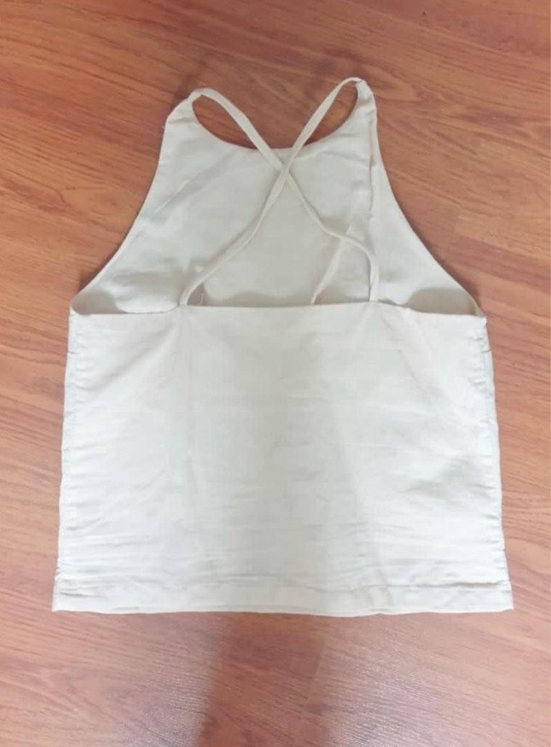 Oat/Beige Linen Top (Category: Sleeveless) located in Quezon. Submitted by indmlnt (Listing ID 1184980246, Image 2). Description: Washed but never worn Bought it with slight stain (see photos) Retail price is 1,200 Brand: Isla Ethis Super cute but too small for me.