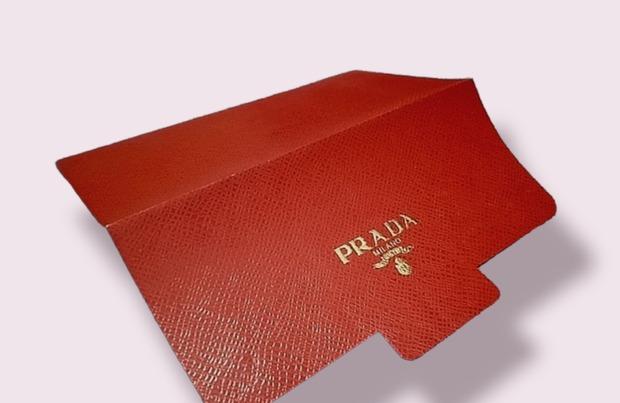Original PRADA Cash Envelope (Category: Luxury Bags & Wallets) located in Taguig. Submitted by sprooced (Listing ID 1184967634, Image 3). Description: - Non-merchandise (free from purchase in Prada Singapore) - Php 250/piece - The seller is not associated/connected with Prada - ONLY SENDING PARCELS WITHIN METRO MANILA Via Grab - WILL NEVER USE GOGO EXPRESS DUE TO A BAD EXPERIENCE.