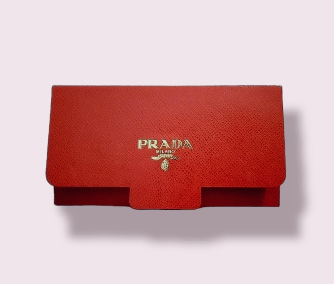Original PRADA Cash Envelope (Category: Luxury Bags & Wallets) located in Taguig. Submitted by sprooced (Listing ID 1184967634, Image 1). Description: - Non-merchandise (free from purchase in Prada Singapore) - Php 250/piece - The seller is not associated/connected with Prada - ONLY SENDING PARCELS WITHIN METRO MANILA Via Grab - WILL NEVER USE GOGO EXPRESS DUE TO A BAD EXPERIENCE.