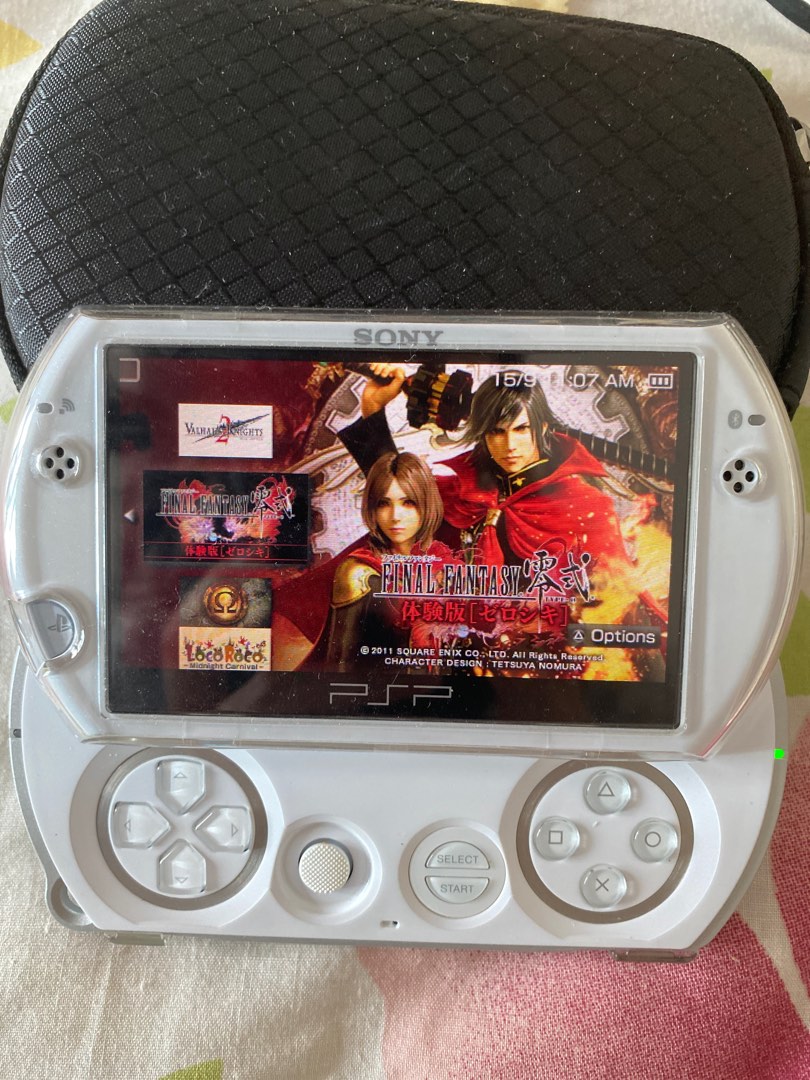 PSPGO with games white Video Gaming Video Game Consoles