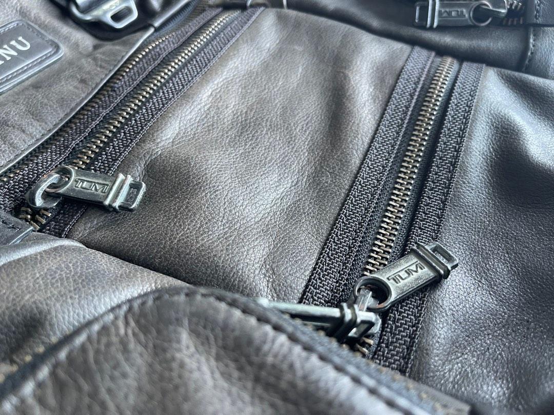 Used tumi leather backpack discount