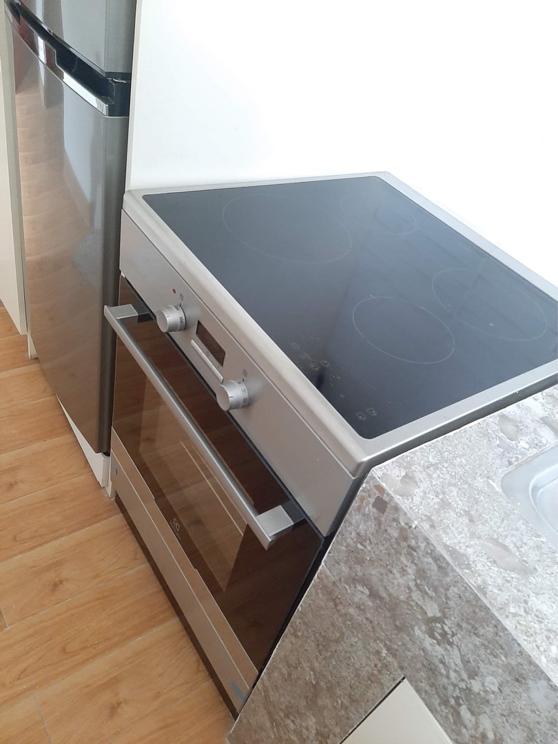 RUSH SALE!! Electrolux Induction Stove with oven, Furniture & Home