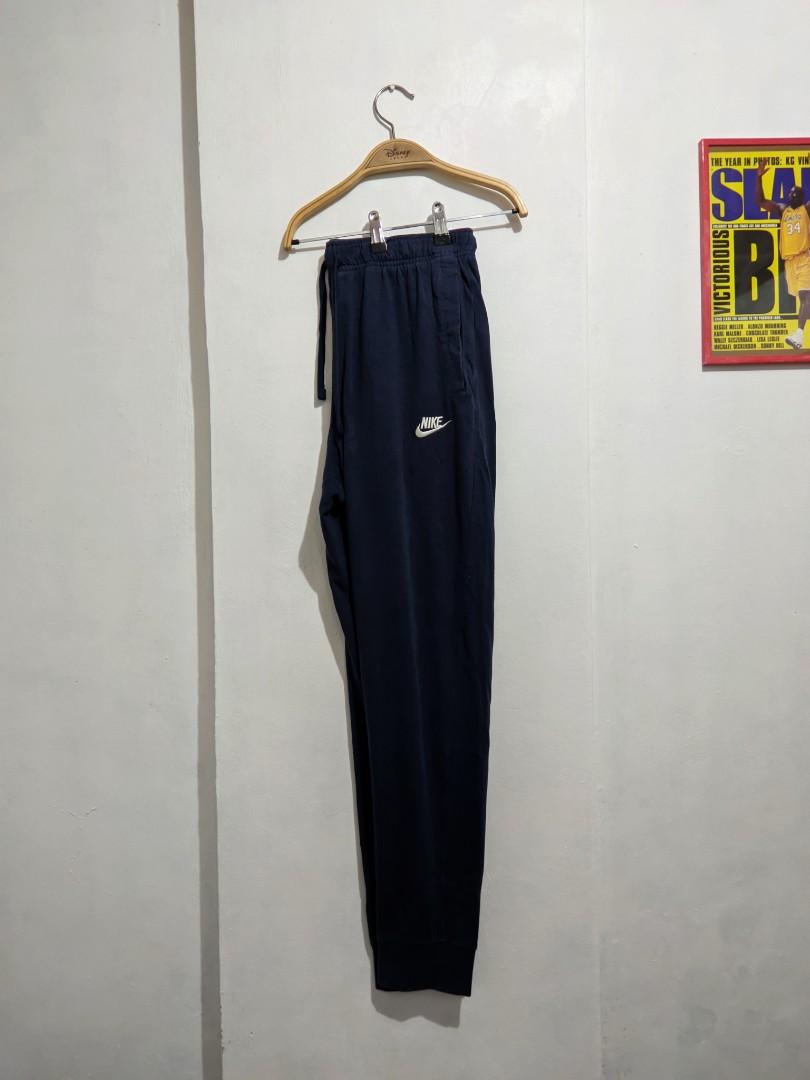 nike logo all over sweatpants
