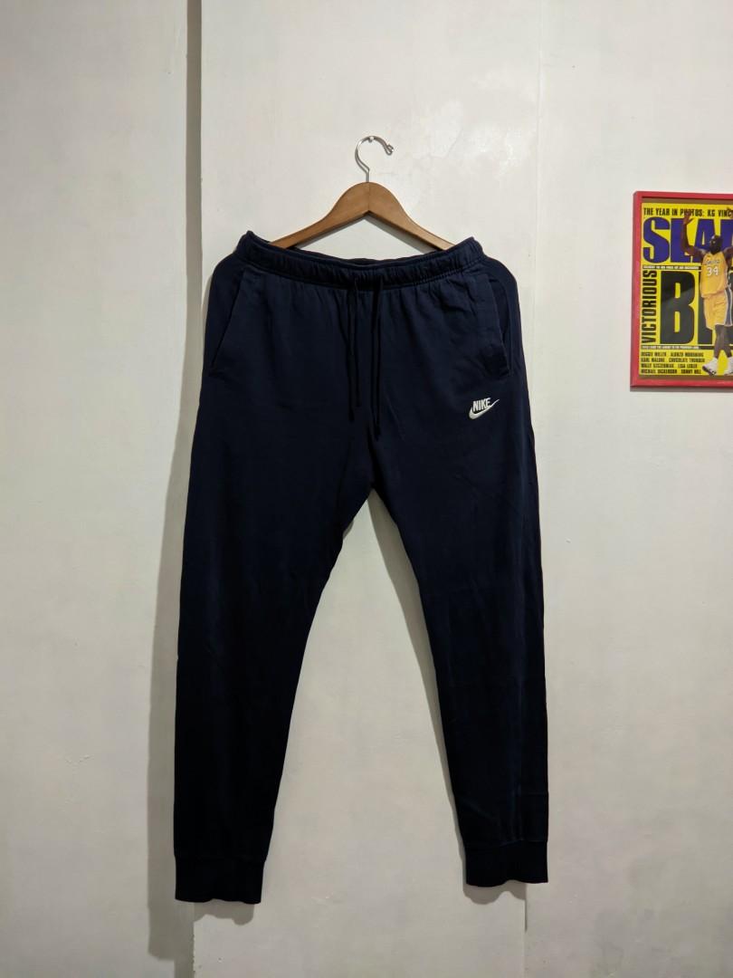 nike logo all over sweatpants