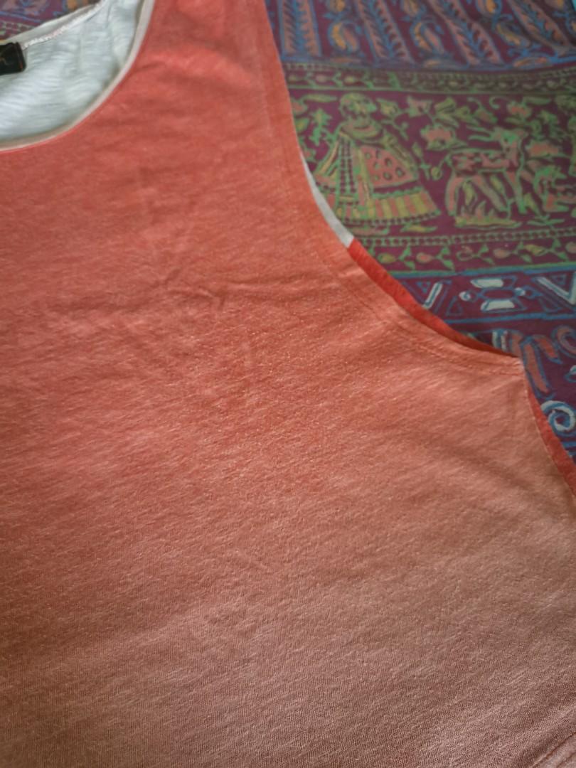 🍊 Orange ombre muscle tee (Category: Sleeveless) located in Muntinlupa City. Submitted by circleback (Listing ID 1185381405, Image 2). Description: Well used, but definitely still wearable! Pretty color and breathable fabric - perfect for lounging at home or at the beach :) Has some loose stitching. Feel free to message for more photos or measurements :).