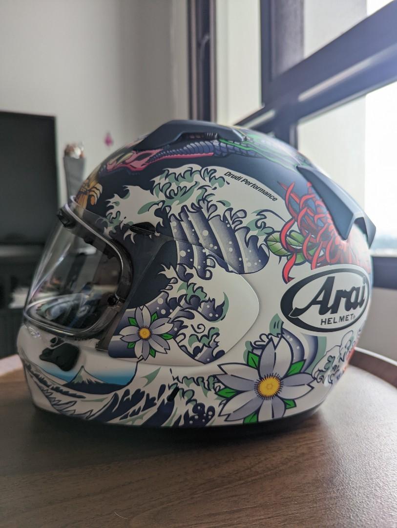 2 x Arai Full Face Racing Helmet (Oriental & Nakasuga 21) (Category: Motorcycle Accessories) located in Singapore. Submitted by kixforlyfe (Listing ID 1185357885, Image 1). Description: Arai full-face racing helmet Suitable for sportsbike riders Imported by Chiap Lee Selling as a bundle of 2 $750 each if ala carte - refer to individual listings: Oriental in matte blue - Size S (55.56cm) https://carousell.app.link/wb9McrOfotb Nakasuga 21 (blue dra