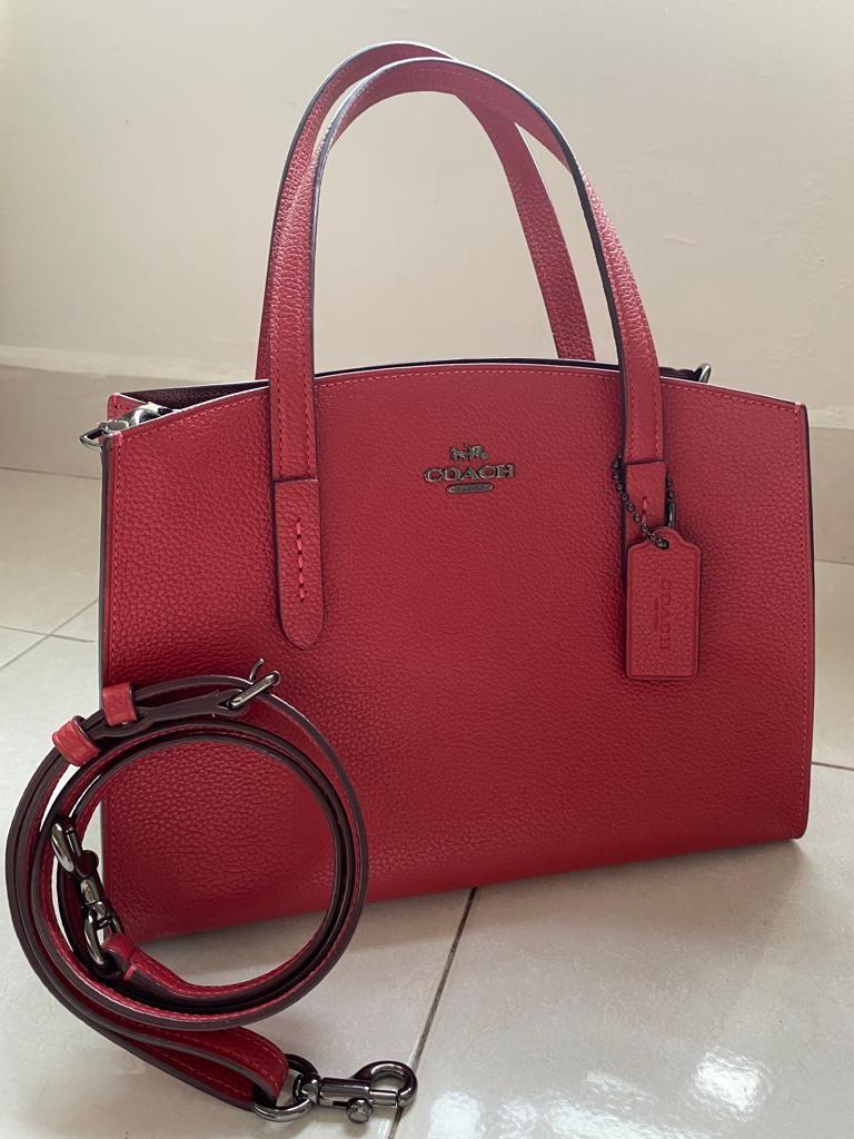 Coach polished pebble leather charlie carryall sales