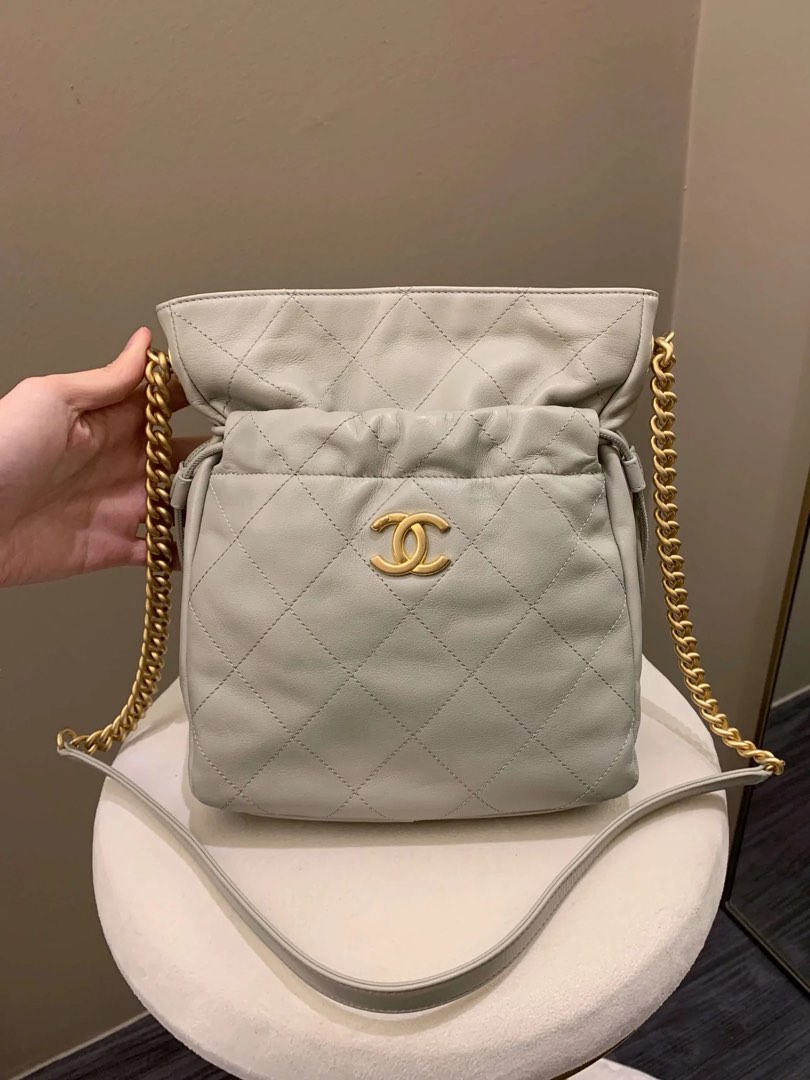 Chanel quilted drawstring sales bag