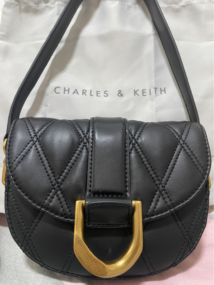 Charles & Keith Mini Gabine Quilted Saddle Bag, Women's Fashion, Bags