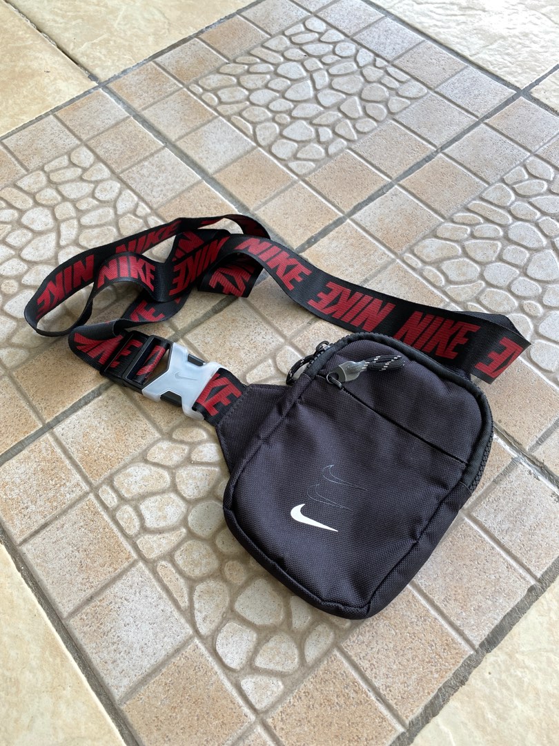 Nike swoosh arrow sling bag deals