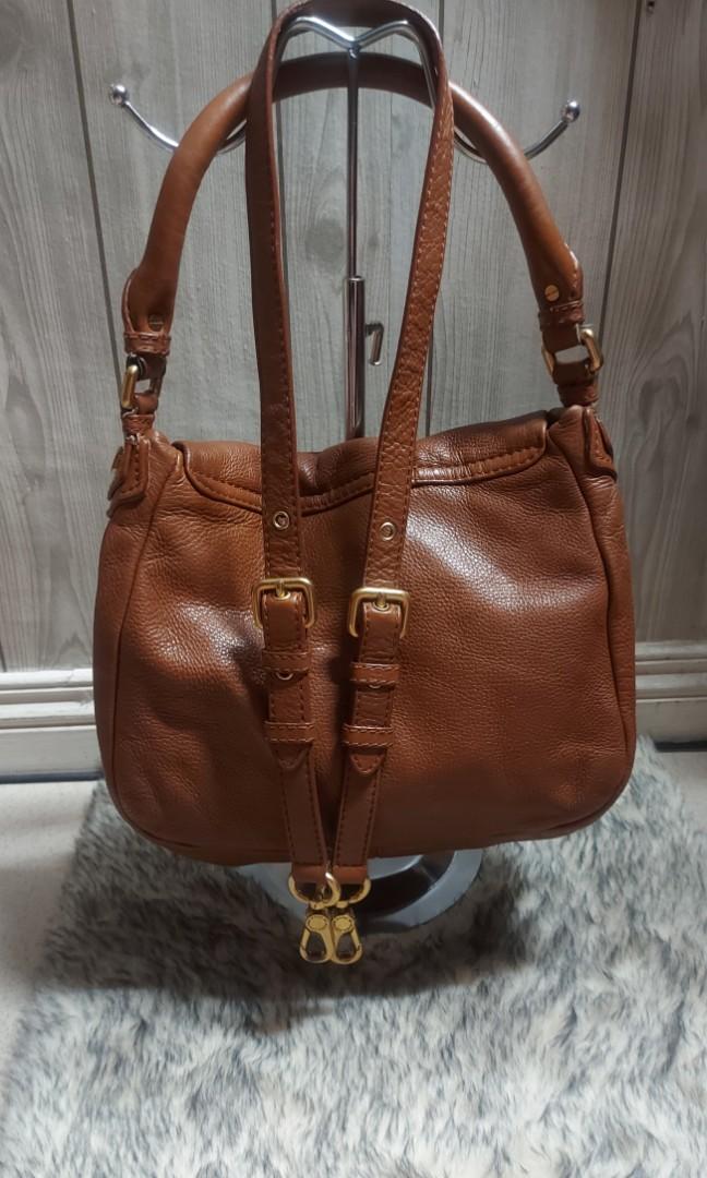 PRELOVED Marc Jacobs Lil Ukita (Category: Luxury Bags & Wallets) located in Quezon City. Submitted by yourlittleshop_yls (Listing ID 1185315610, Image 2). Description: FIXED‼️‼️‼️Preloved Marc Jacobs Lil Ukita 2way bag,authentic 100% Cow leather sign of used manage ur expectations on Preloved item refer photos for flaws/issue issue is ung hardware sa strap nya natatanggal.