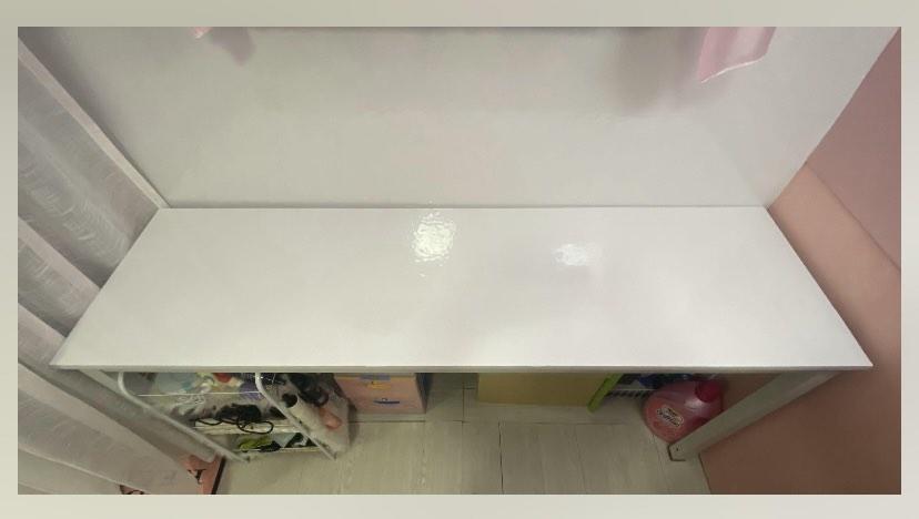 Work/Study/Console Table (Category: Tables & Sets) located in Singapore. Submitted by bumblebeev (Listing ID 1185296780, Image 1). Description: Laminated metal table top with metal legs Table only, all items in picture are not included. Table top surface is still smooth, stain free See 3rd pic for peels at the side Take note of table structure if you intent to mount a monitor stand or measure space to slot a chair in. Wood boards are my own adjus
