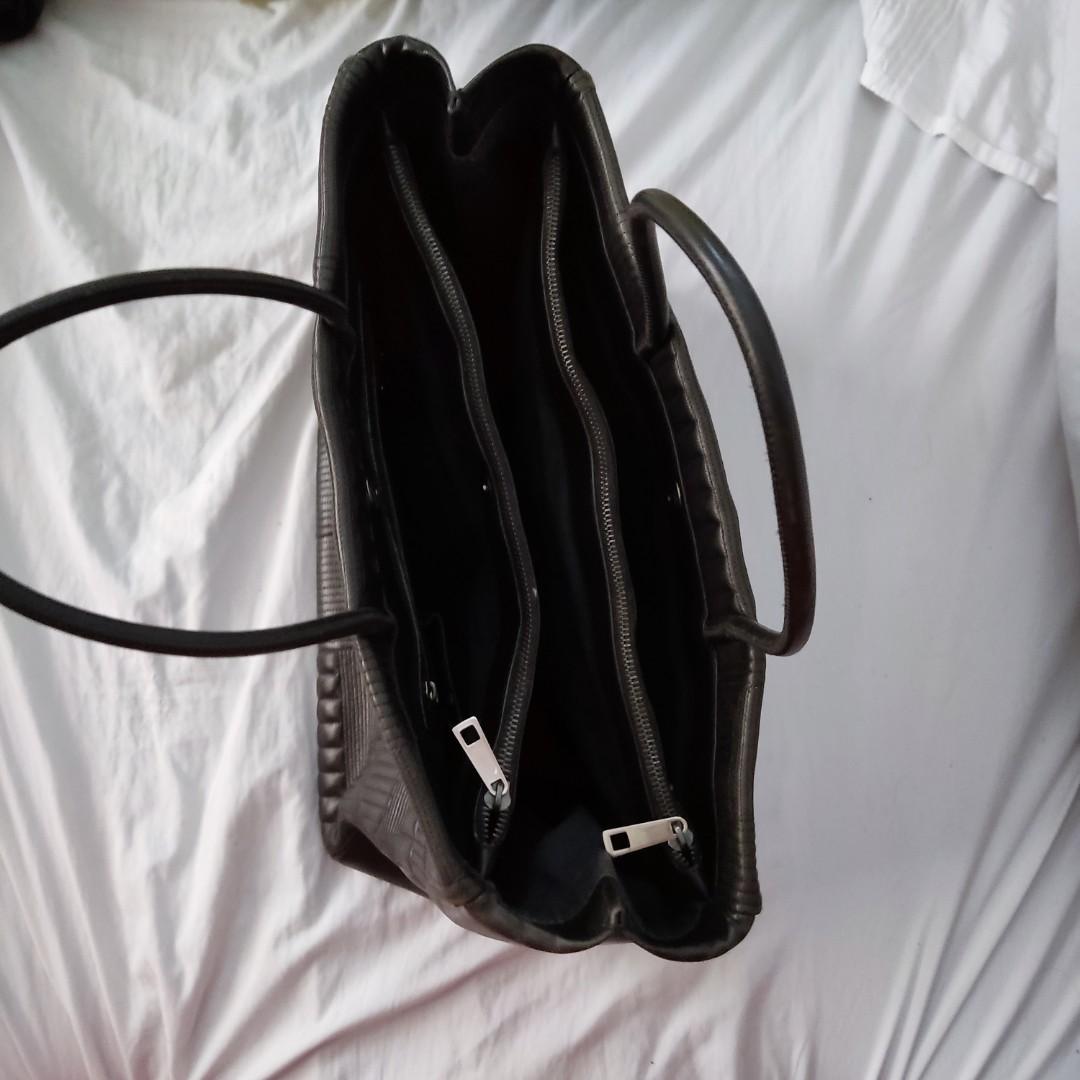 BALLY Leather Bag (Category: Luxury Bags & Wallets) located in Paranaque City. Submitted by m2m_shop0919 (Listing ID 1185514862, Image 3). Description: Bally leather bag in excellent and pristine condition. Large size with lots of pockets and compartments. Riri zipper, Made in Italy. Dimensions: 13.5 in. W (Front) x 11.5 in H x 7.5 in. W (side) Now for only Php 3,500 (From 5,000 previously) Sold for 23,300 yen (see the link below) https://paypayf