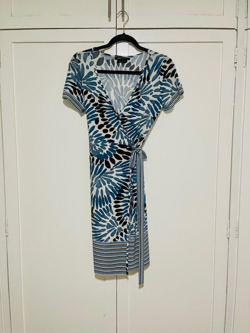 BCBG Max Azaria Wrap Dress (Category: Dresses) located in Makati City. Submitted by justaskro (Listing ID 1185662472, Image 1). Description: Printed. Blue and black Very Flattering Adjustable Decluttering .