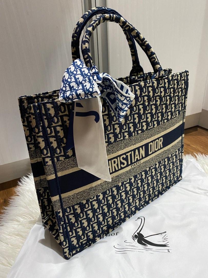 Christian Dior Classic Tote Bag Large (Category: Luxury Bags & Wallets) located in Quezon City. Submitted by reeseberrychic (Listing ID 1185667177, Image 2). Description: Christian Dior Classic Book Tote Large condition 10/10 Japan Korea source looks new with free twilly and dustbag .