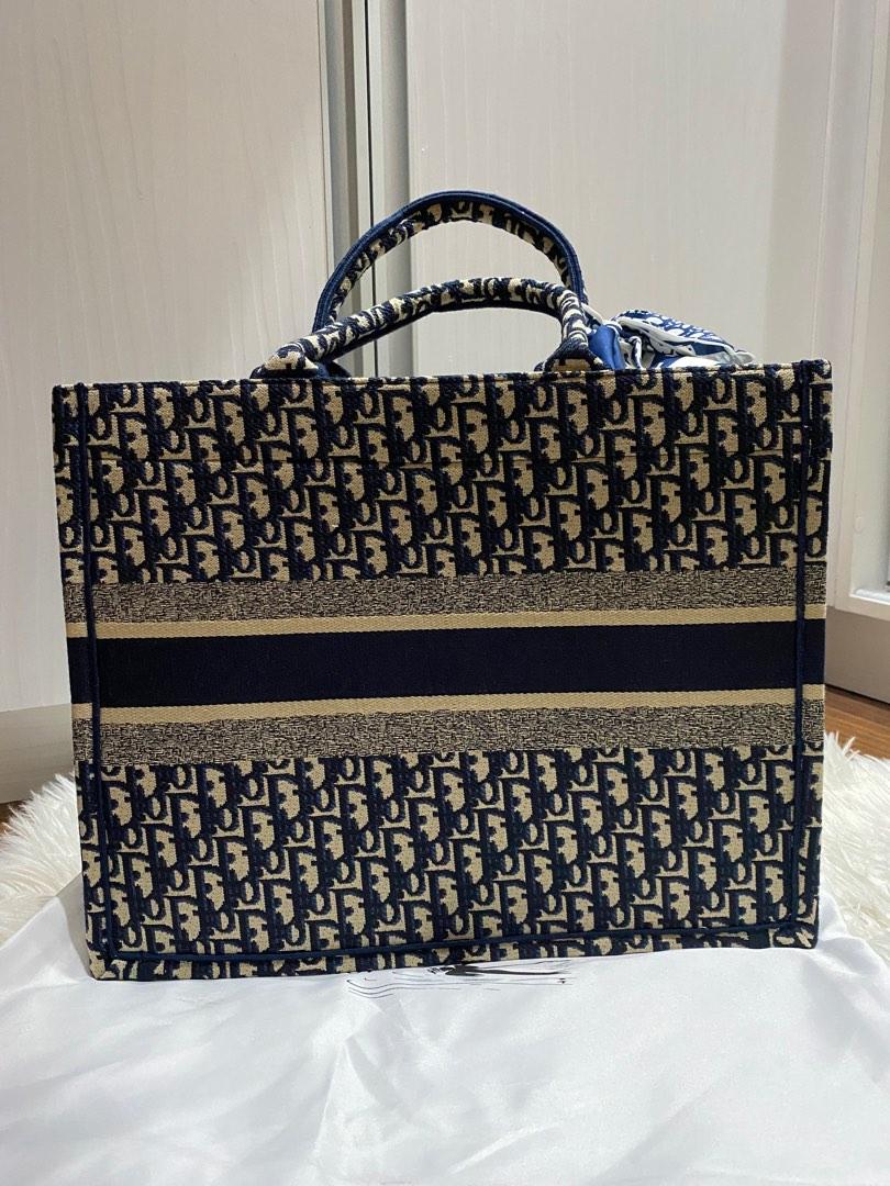 Christian Dior Classic Tote Bag Large (Category: Luxury Bags & Wallets) located in Quezon City. Submitted by reeseberrychic (Listing ID 1185667177, Image 3). Description: Christian Dior Classic Book Tote Large condition 10/10 Japan Korea source looks new with free twilly and dustbag .