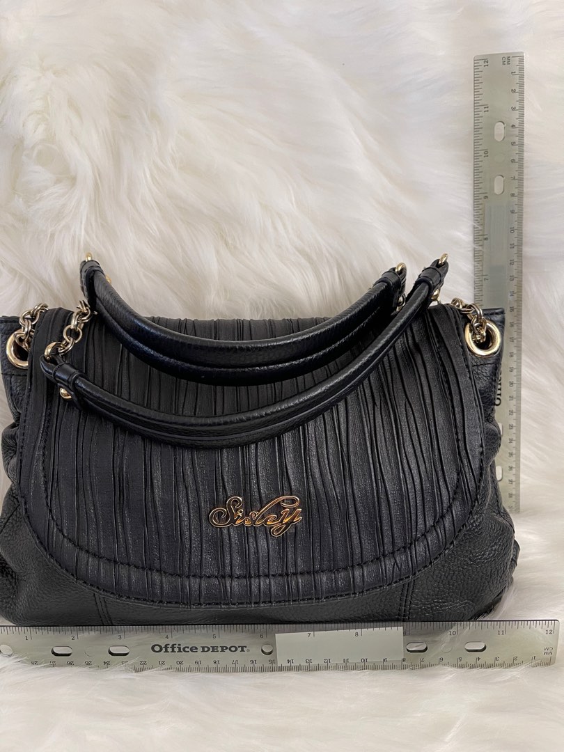 Sisley crossbody bag (black leather), Luxury, Bags & Wallets on Carousell