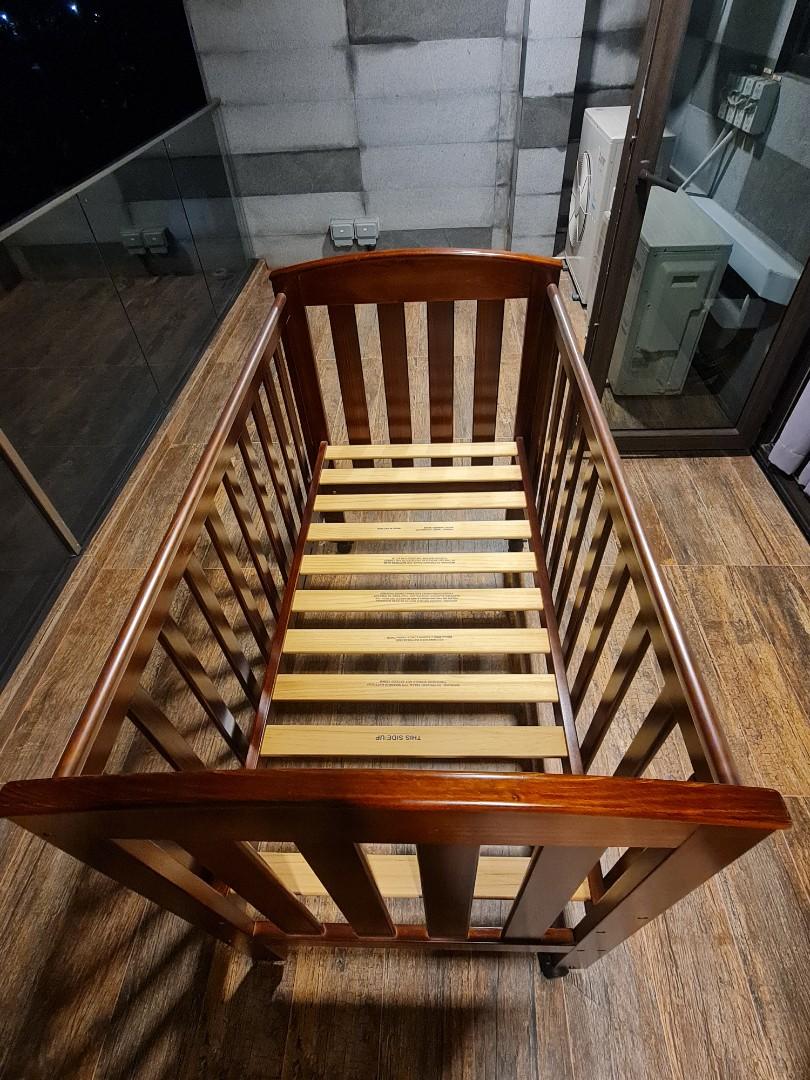 Solid wood baby cot, Babies & Kids, Baby Nursery & Kids Furniture, Cots & Cribs on Carousell
