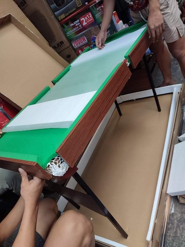 Billiard Table Junior Set (Category: Billiards and Bowling) located in Manila. Submitted by min_yoongi (Listing ID 1185772587, Image 2). Description: BRAND NEW ✓ Sealed ✓ Billiard Set SUB5427 - Junior 54 x 27 x 30 Table Size: 54" (L) x 27" (W) x 30" (H) ✓ 2 pcs taco ✓ 1 set Marble Ball ✓1 pc triangle Deliver: Lalamove or Grab or Speedy Mode of Payment: COD, Gcash, Online Bank transfer PM for inquiries..