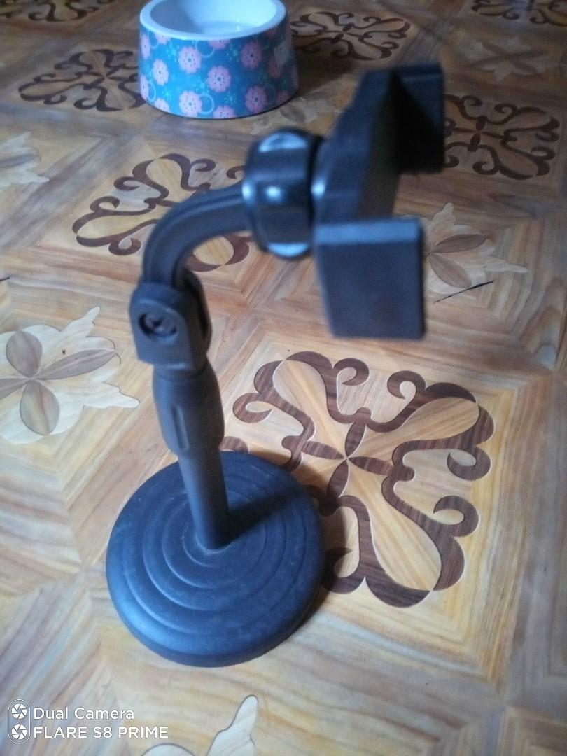 Cellphone stand (Category: Mounts & Holders) located in San Juan City. Submitted by richard.heart (Listing ID 1185766967, Image 3). Description: Generic cellphone stand. stands about 11"inches in high. Cherry Mobile S8 used as demonstration but not included..